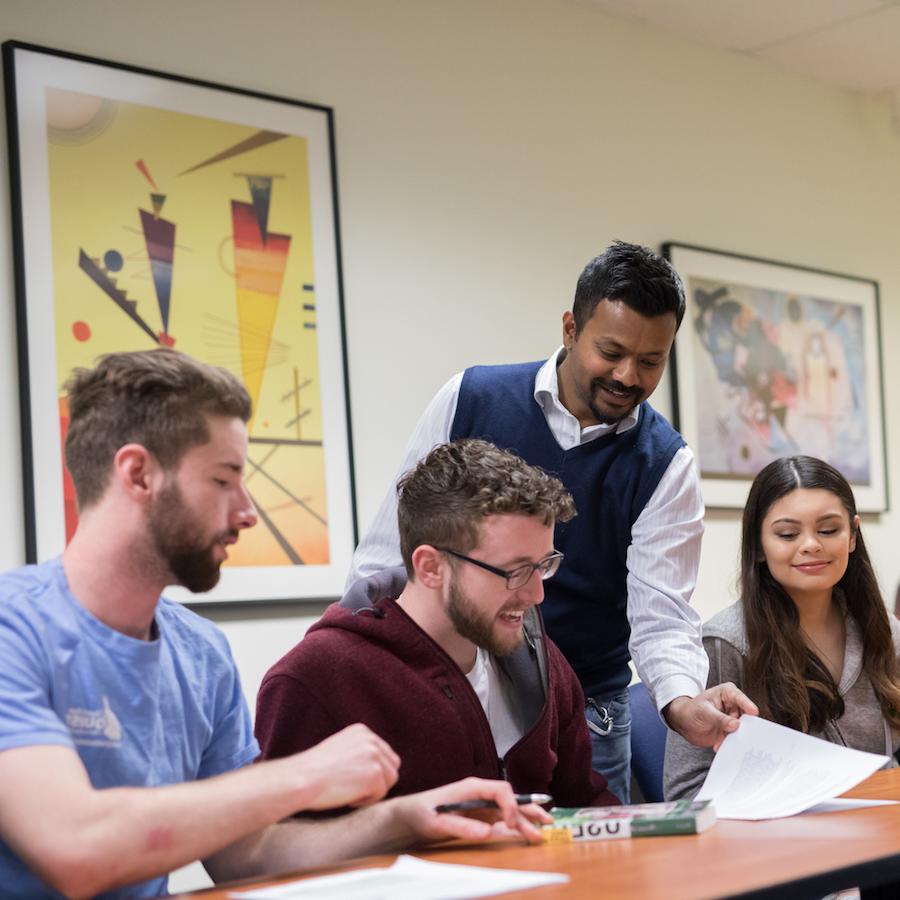 Faculty with students