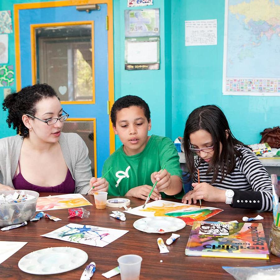 UMass student teaches art at Denny afterschool program.